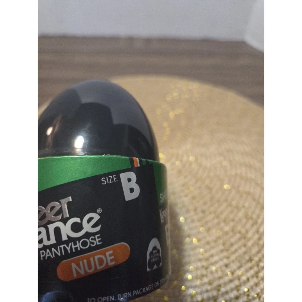 L'eggs Sheer Elegance pantyhose in its classic black egg packaging Size B Nude